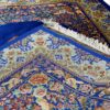 فرش دستباف ابریشم قم طرح گل‌دار - آبی