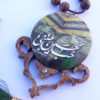 آویز آویز آینه عقب ماشین اسلامی، اول حسین