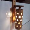 چراغ دیواری چوبی قابل تنظیم با طراحی سوراخ دار