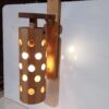 چراغ دیواری چوبی قابل تنظیم با طراحی سوراخ دار