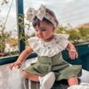 پیشبند نوزادی زیبا با طرح گل مدل پارادایس