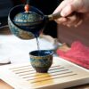 سرویس چایخوری چینی ژاپنی با قوری چرخشی ۳۶۰ درجه