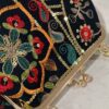 کیف دستی مجلسی مخمل گلدوزی شده با طرح گل و برگ