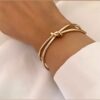 Minimal Knot Cuff Bracelet – Symbol of Strength & Connection for Special Moments (2)